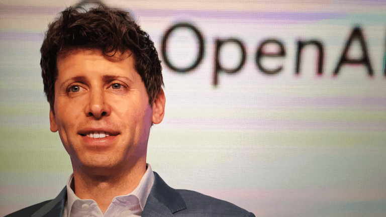 OpenAI CEO Sam Altman speaking at an event.