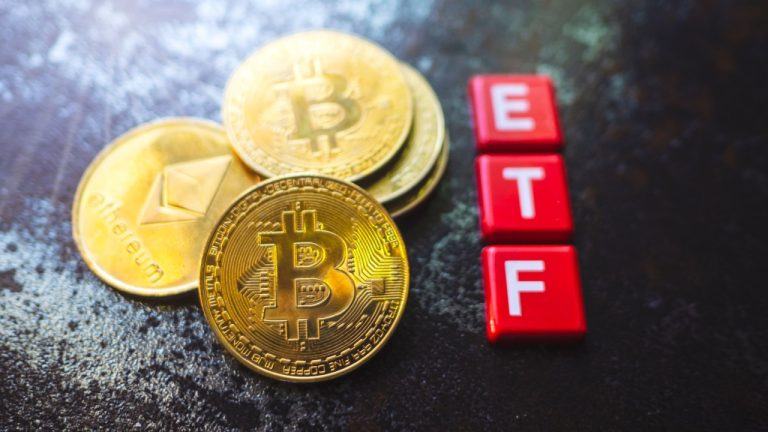 Bitcoin and Ether coins with ETF written beside it