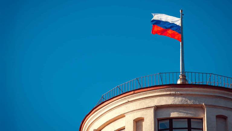 Image of the Russian flag atop a turret.