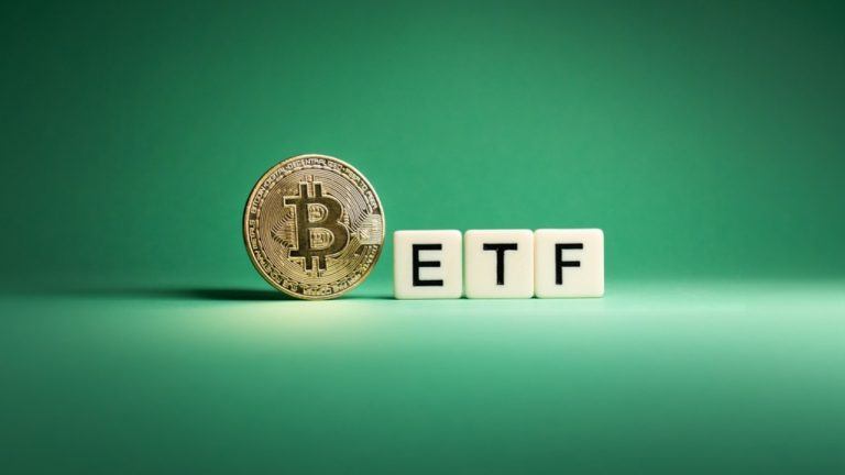 Bitcoin and ETF text on green background
