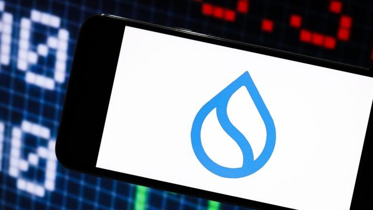 Logo of Sui blockchain in a phone