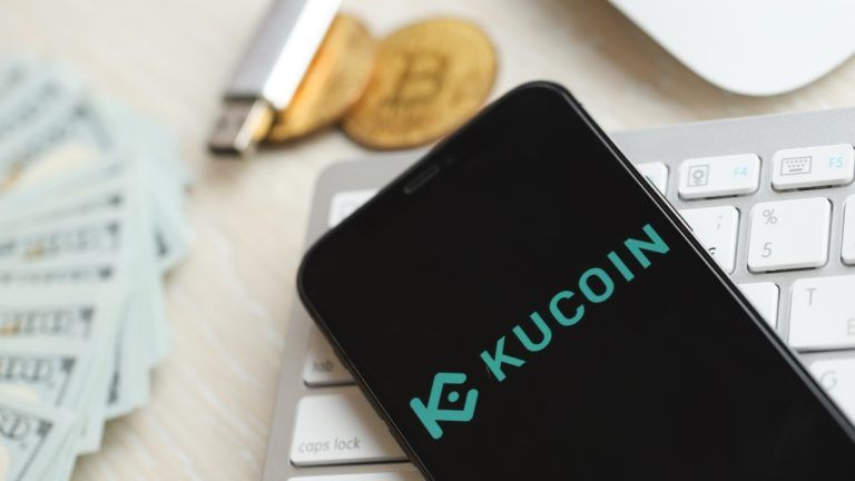 Kucoin logo on mobile phone display screen