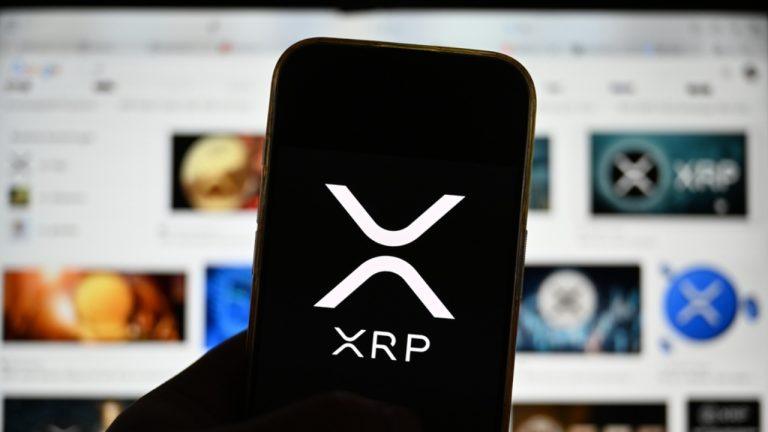 XRP logo on mobile phone